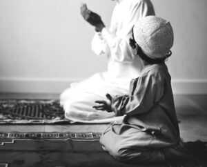 muslim-boy-learning-how-make-dua-allah_53876-25223