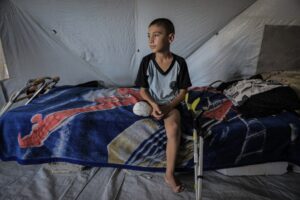 AA-20250708-38501645-38501633-GAZAN_BOY_LOSES_LEG_IN_ISRAELI_STRIKE_WHILE_TRYING_TO_GET_AID_FOR_HIS_FAMILY